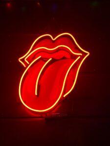 red tongue out neon light signage turned on